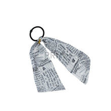 Load image into Gallery viewer, HEIRLOOMS NEWSPRINT PONY HOLDER
