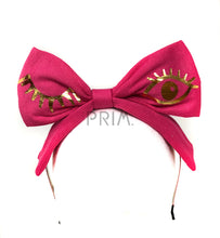 Load image into Gallery viewer, RIBBED BOW HEADBAND WITH FOIL WINK
