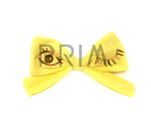 Load image into Gallery viewer, RIBBED BOW CLIP WITH FOIL WINK
