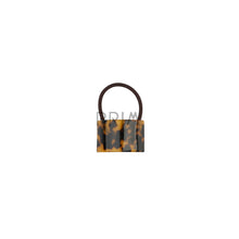 Load image into Gallery viewer, HEIRLOOMS RESIN LEOPARD PONY HOLDER
